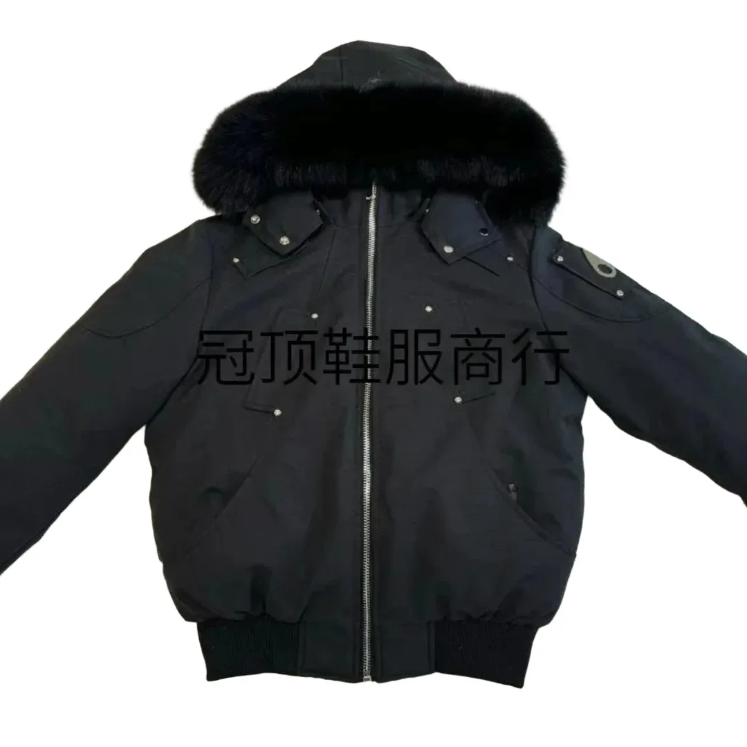 Black workwear parka with a large fur collar